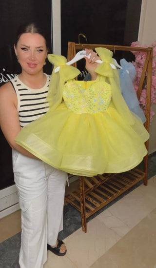 Yellow Girl's Evening Dress with Bows on the Shoulders